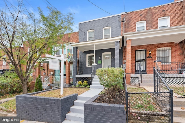 multi unit property featuring covered porch