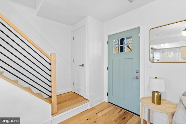 foyer with hardwood / wood-style flooring