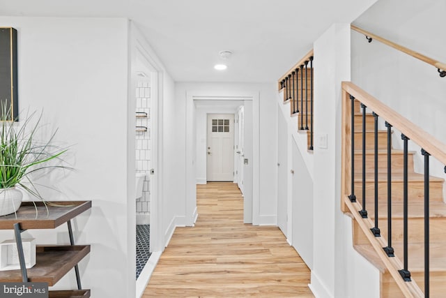 hallway featuring light hardwood / wood-style flooring