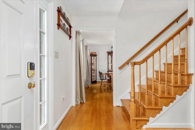 foyer entrance featuring light wood-type flooring