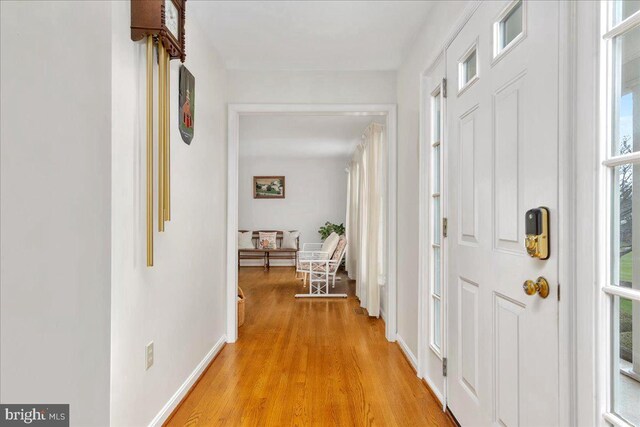 hallway featuring light hardwood / wood-style floors