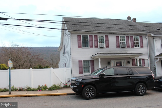 view of front of house with cooling unit