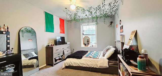 bedroom with carpet and ceiling fan