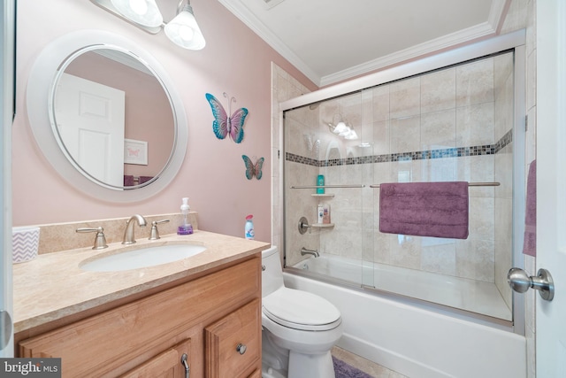 full bathroom with toilet, vanity, combined bath / shower with glass door, and ornamental molding