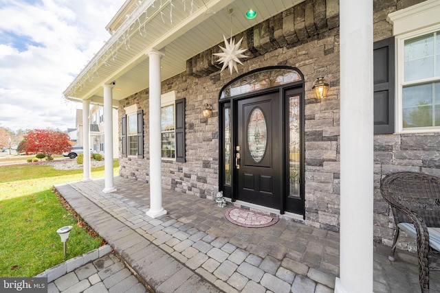 property entrance with a porch