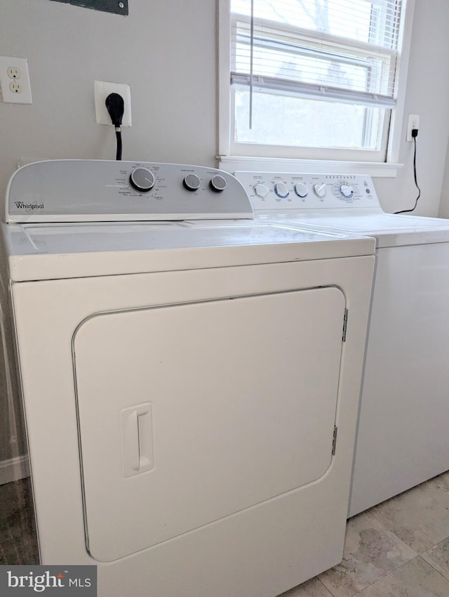 laundry area with washer and clothes dryer