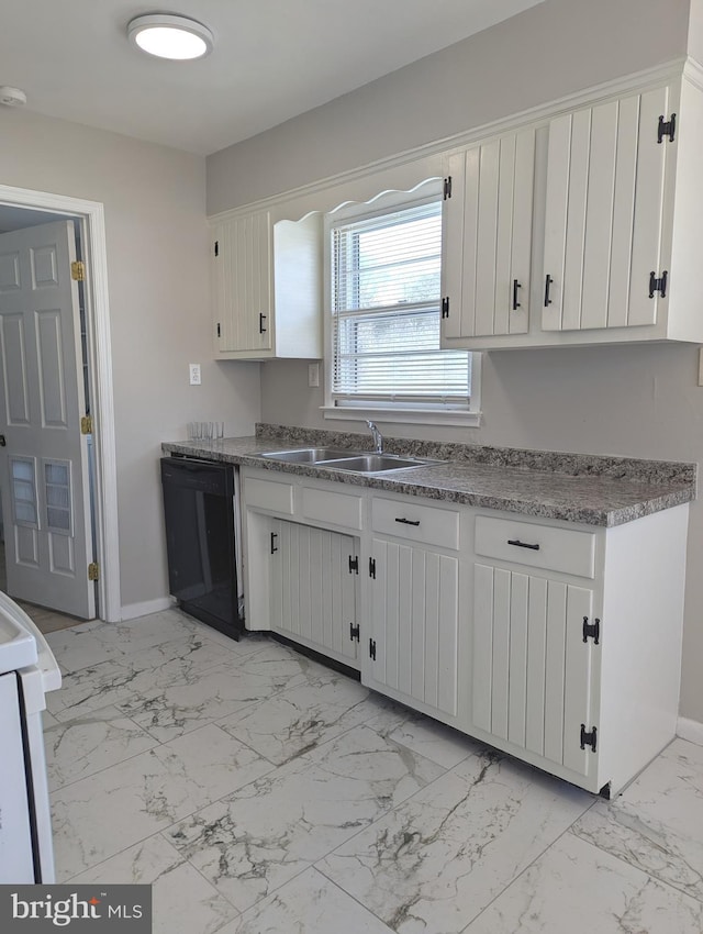 kitchen featuring white cabinetry, stove, black dishwasher, and sink