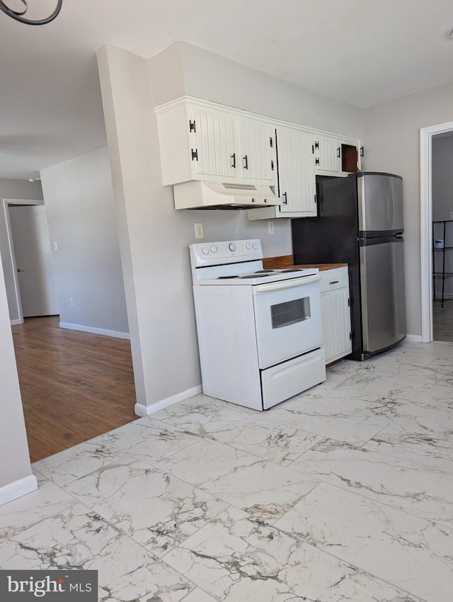 kitchen with stainless steel fridge, white electric stove, and white cabinets