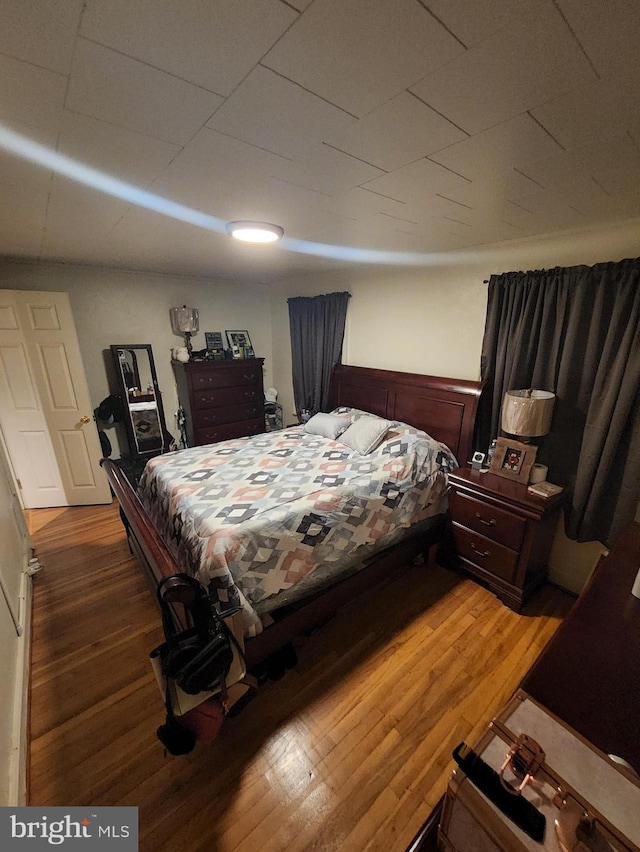 bedroom featuring hardwood / wood-style flooring