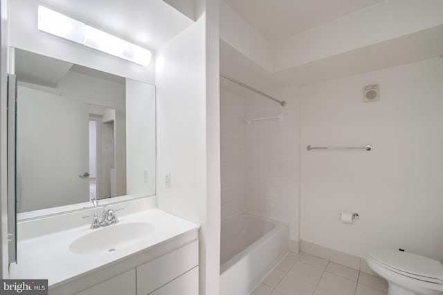 full bathroom featuring toilet, tile patterned flooring, tiled shower / bath combo, and vanity