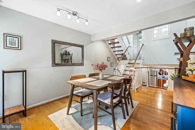 dining space featuring light hardwood / wood-style floors