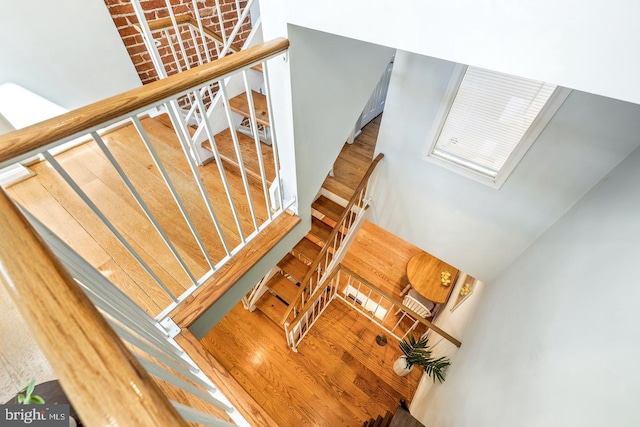 stairs with wood-type flooring