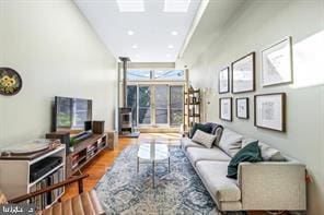 living room featuring a healthy amount of sunlight and wood-type flooring