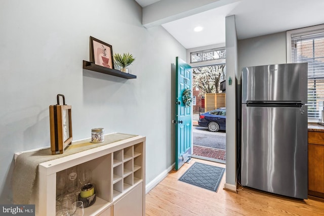 doorway featuring light hardwood / wood-style floors