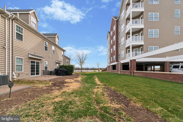 view of yard featuring central AC unit