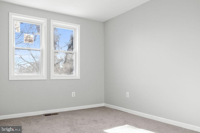 view of carpeted spare room