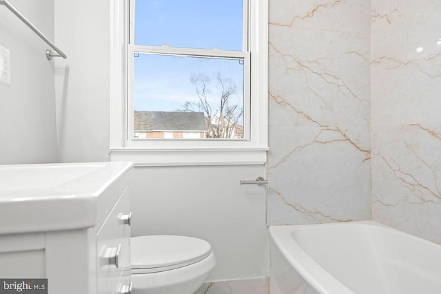 bathroom with toilet and shower / bath combination