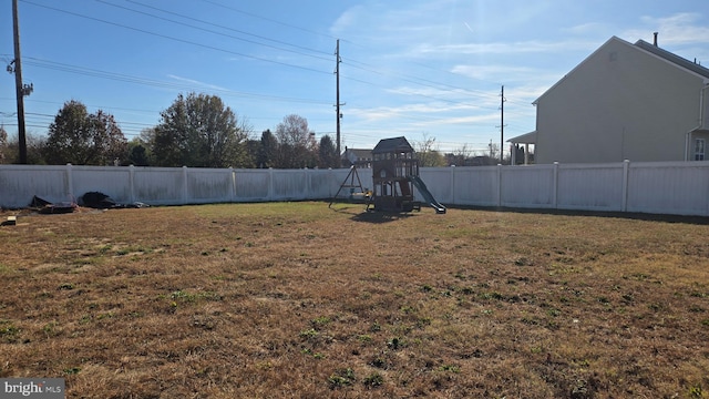 view of yard with a playground