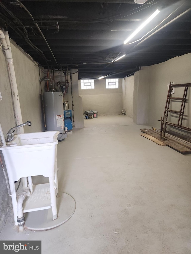 basement featuring gas water heater