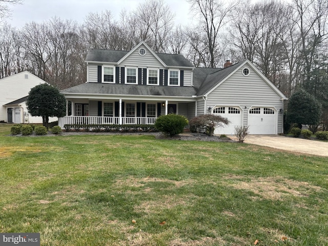 view of front of property featuring covered porch, a garage, and a front lawn