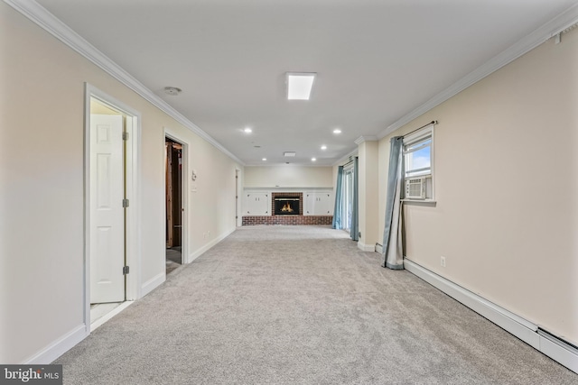 unfurnished living room with a fireplace, a baseboard heating unit, light colored carpet, and crown molding