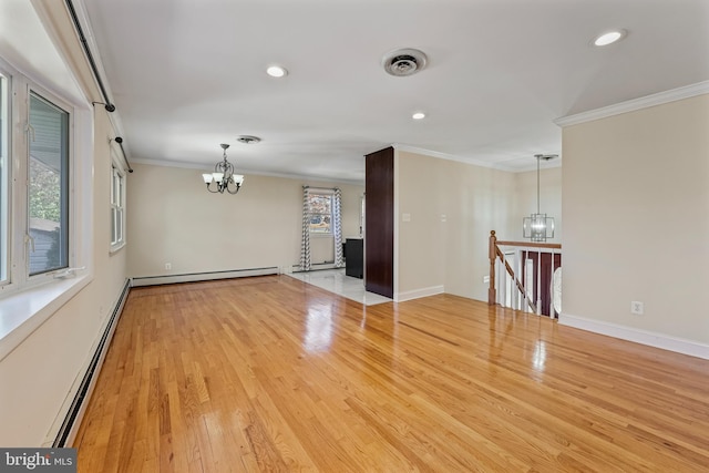 unfurnished room with a chandelier, light hardwood / wood-style floors, a baseboard heating unit, and ornamental molding