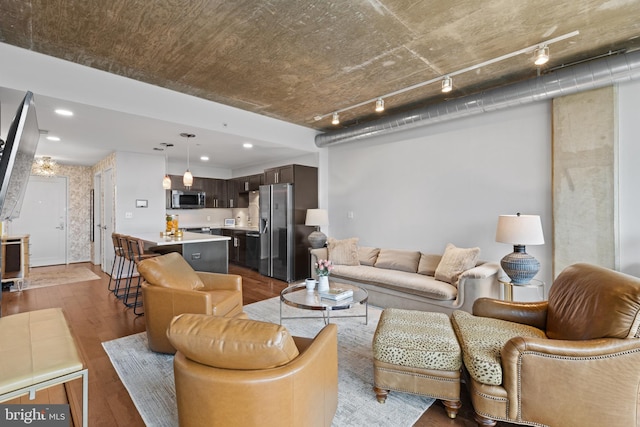 living room with hardwood / wood-style flooring