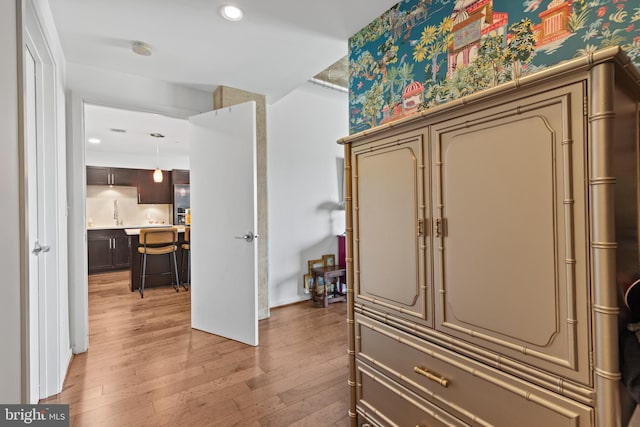 hallway featuring hardwood / wood-style floors