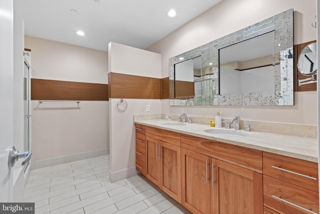 bathroom featuring vanity and enclosed tub / shower combo