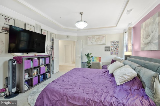 bedroom with a raised ceiling, crown molding, and light colored carpet