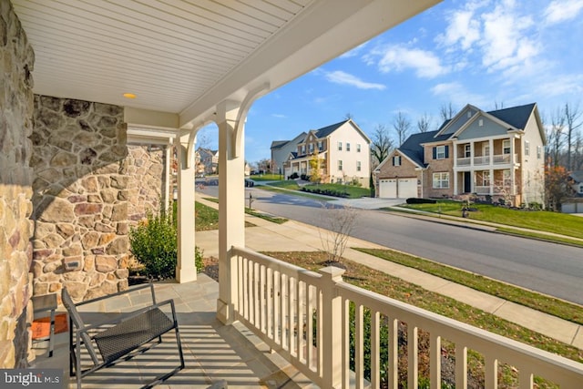 balcony featuring a porch