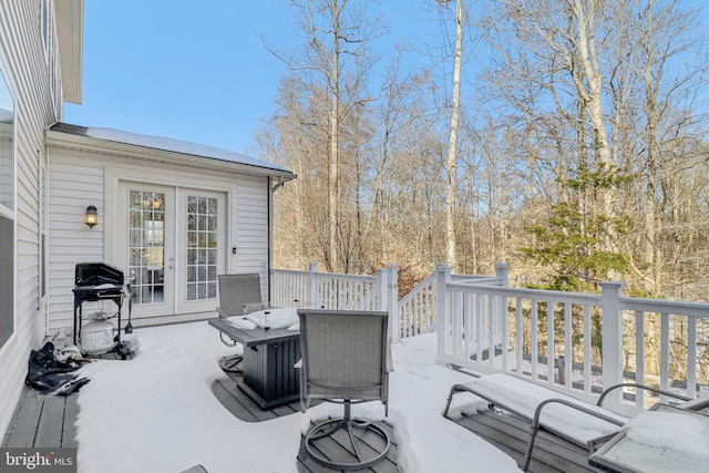 deck featuring grilling area and french doors