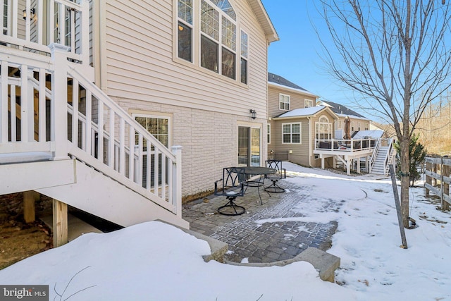 view of snow covered property