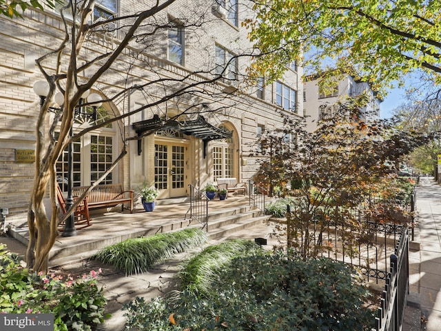 back of property with french doors