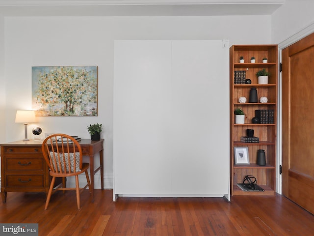 home office with dark wood-type flooring