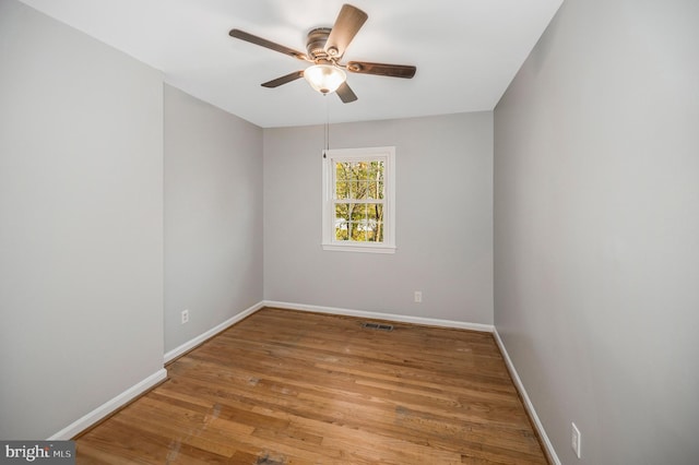 spare room featuring ceiling fan and light wood-type flooring