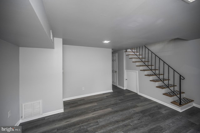 interior space with dark hardwood / wood-style floors