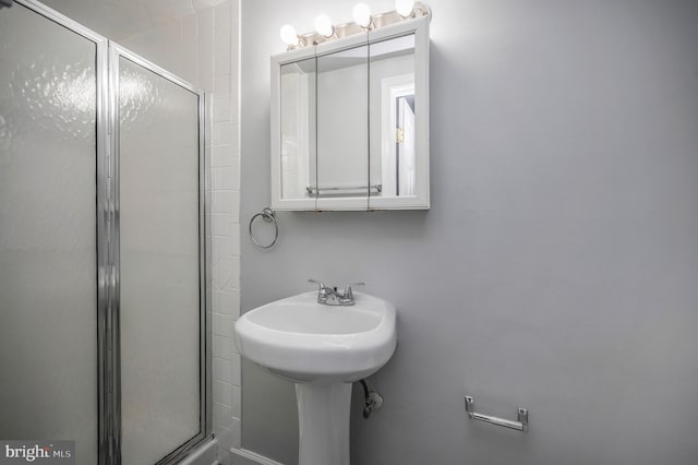 bathroom featuring walk in shower