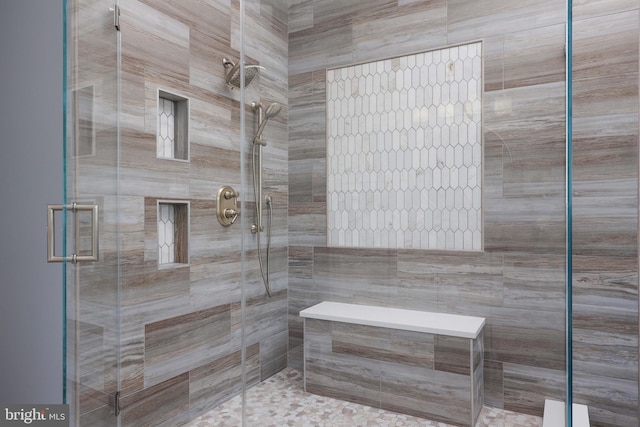 bathroom with an enclosed shower