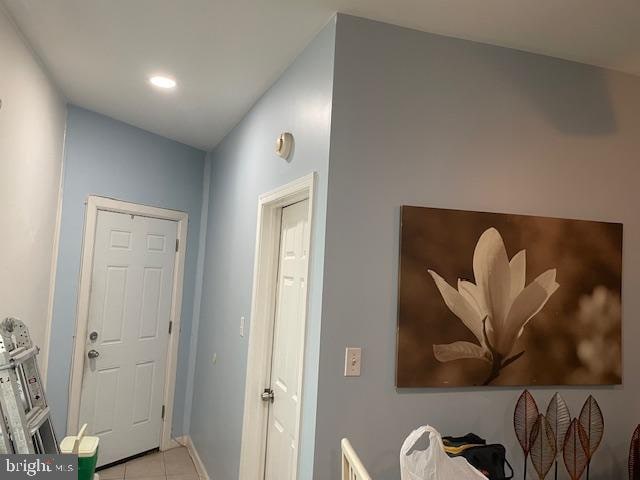 interior space featuring light tile patterned flooring