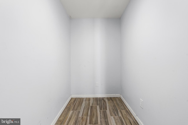 unfurnished room featuring hardwood / wood-style floors