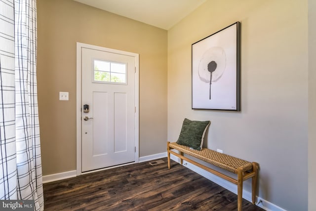 entrance foyer featuring dark hardwood / wood-style floors