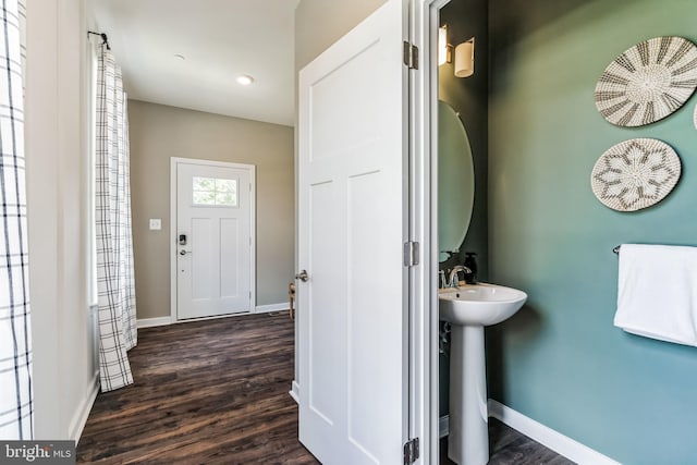 bathroom with sink and hardwood / wood-style flooring