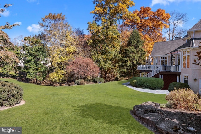 view of yard with a deck