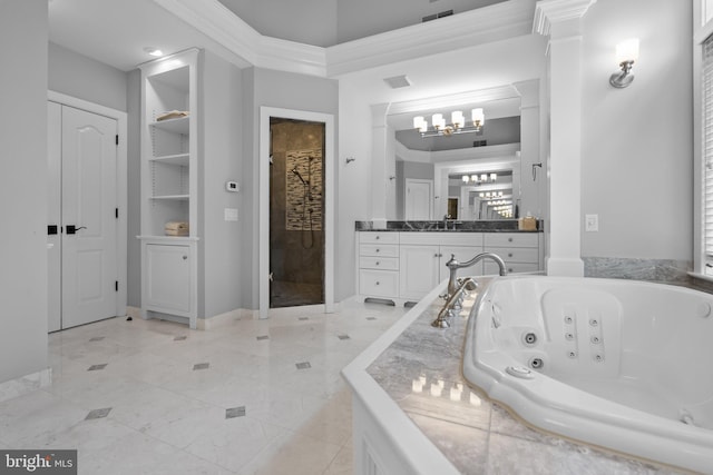 bathroom featuring vanity, a chandelier, and independent shower and bath