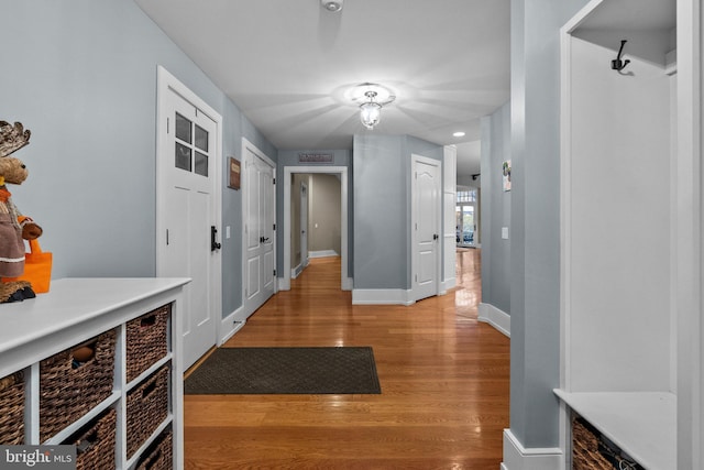 mudroom with light wood-type flooring