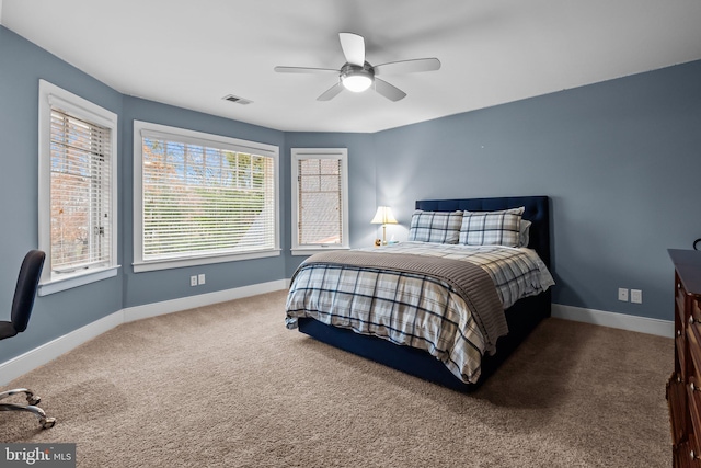 carpeted bedroom featuring ceiling fan