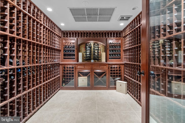 wine area featuring tile patterned flooring