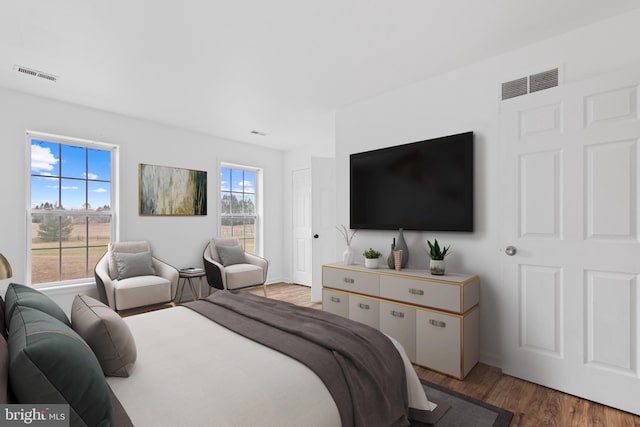 bedroom featuring hardwood / wood-style flooring