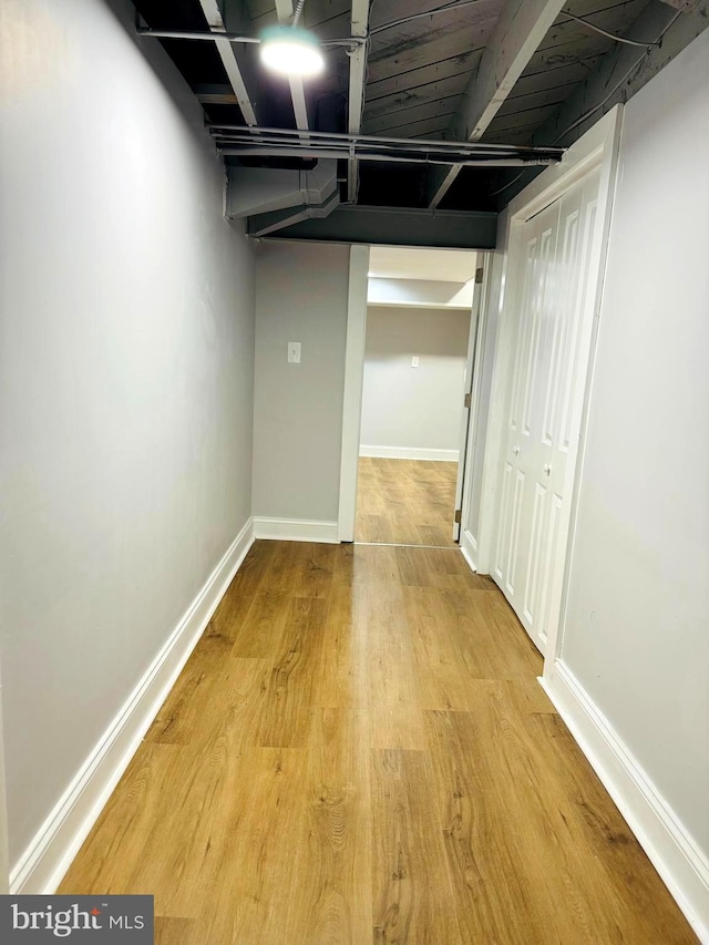 basement with light wood-type flooring